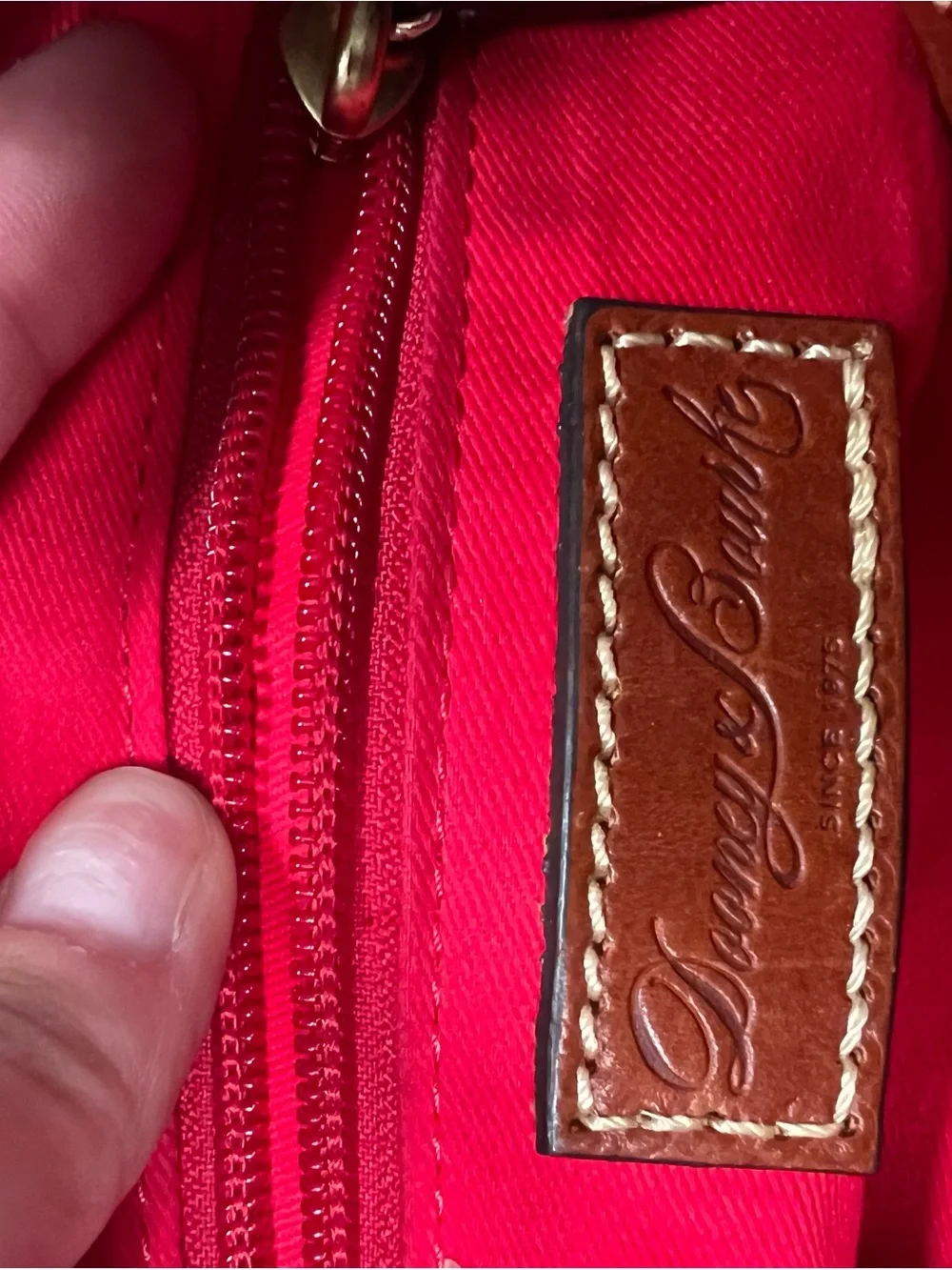 Dooney & Bourke compact pebbled